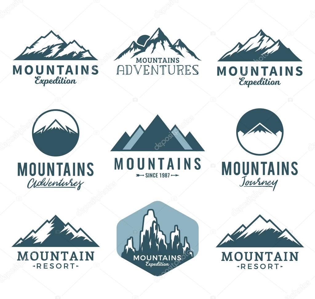 Vector mountains logo isolated on white. Mountains, rocks and peaks icons.