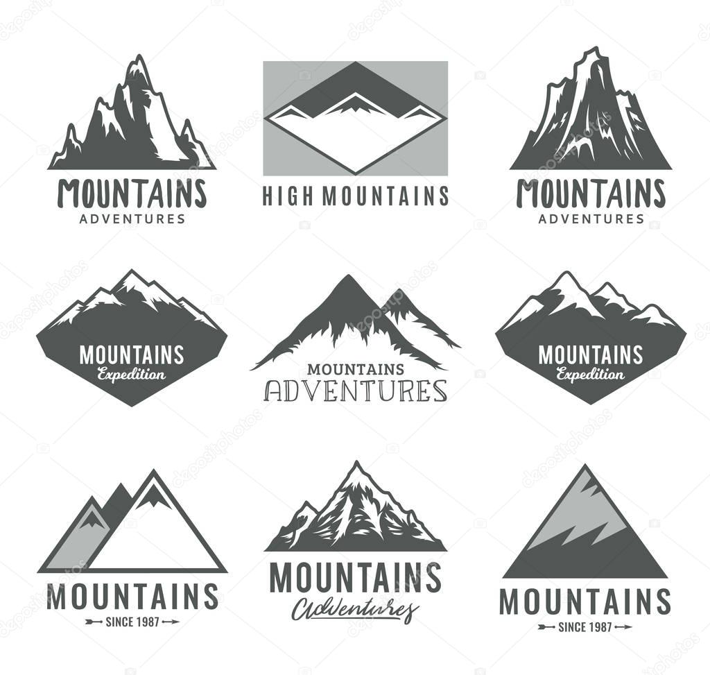 Vector mountains logo isolated on white. Mountains, rocks and peaks icons.