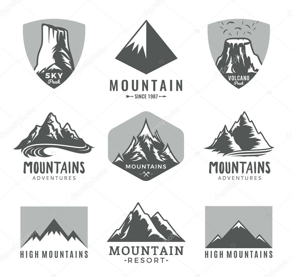Vector mountains logo isolated on white. Mountains, rocks and peaks icons.