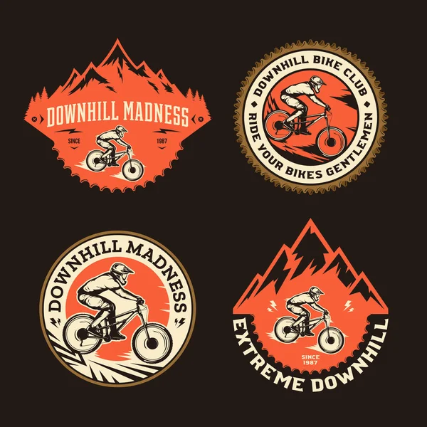 Vector downhill emblemas de bicicleta de montanha —  Vetores de Stock