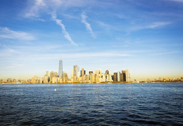 New York skyline in a bright day viewed form Liberty Island