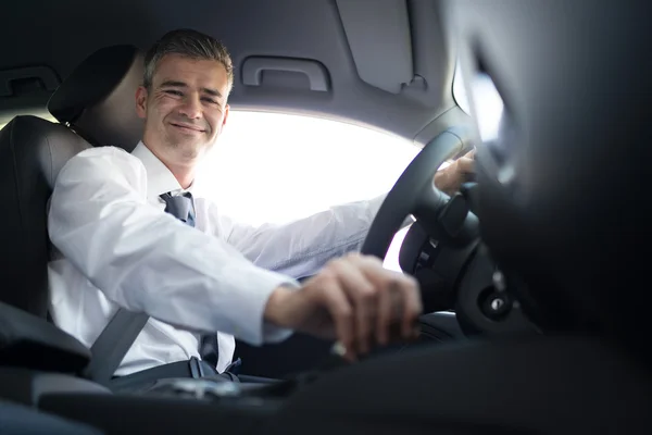 Businessman driving to work — Stock Photo, Image