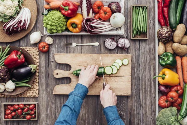 Cooking in a rustic kitchen — Stock Photo, Image