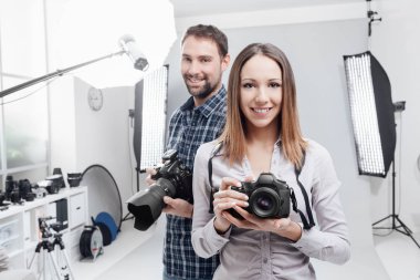 Professional photographers in the studio clipart