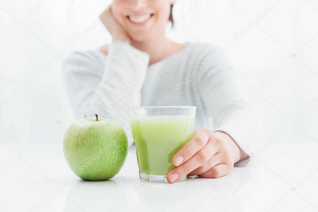 Woman drinking healthy juice