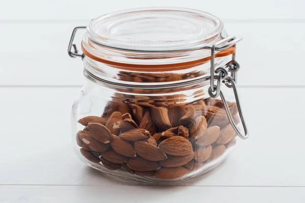 Almonds in a jar — Stock Photo, Image