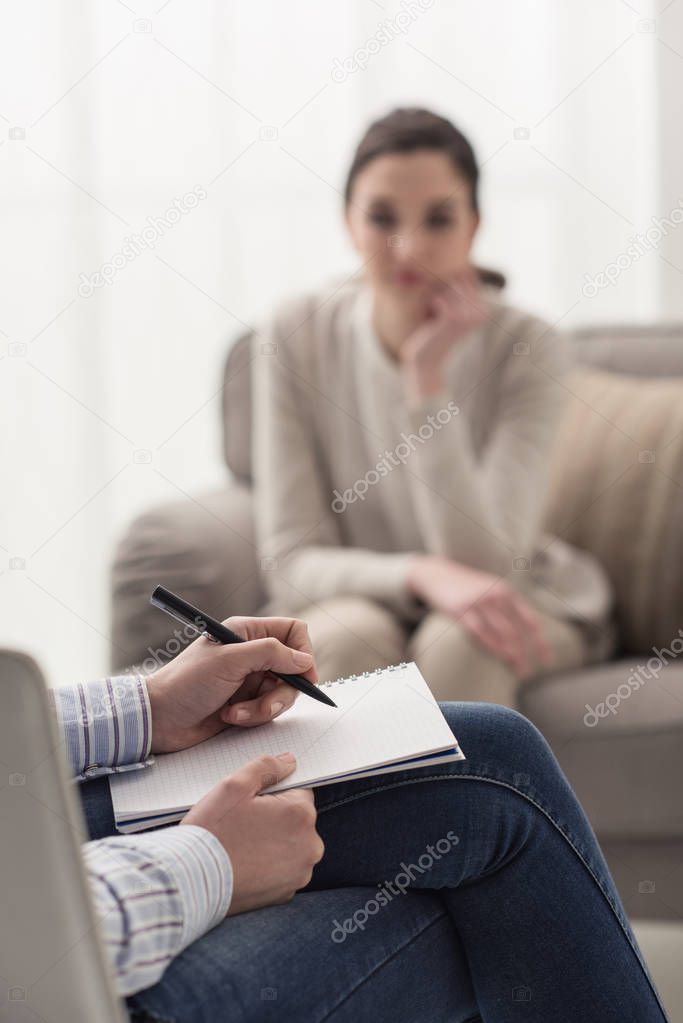 Psychologist listening to her patient