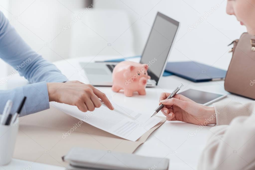 Financial advisor and woman meeting in the office