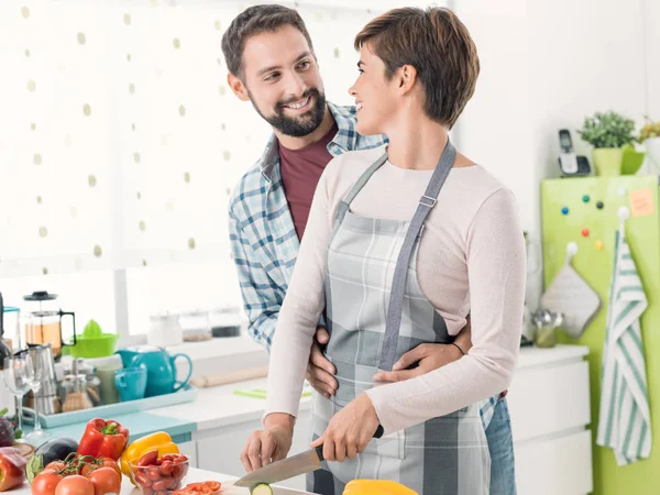 Loving couple cooking together — Stock Photo, Image