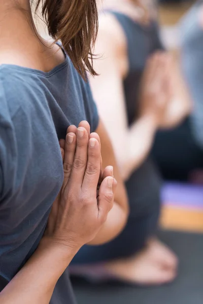 Women practicing yoga: reverse prayer pose — Stock Photo, Image