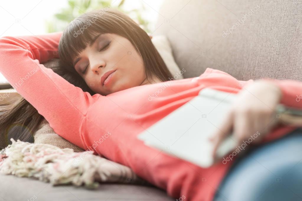 Woman napping on the sofa