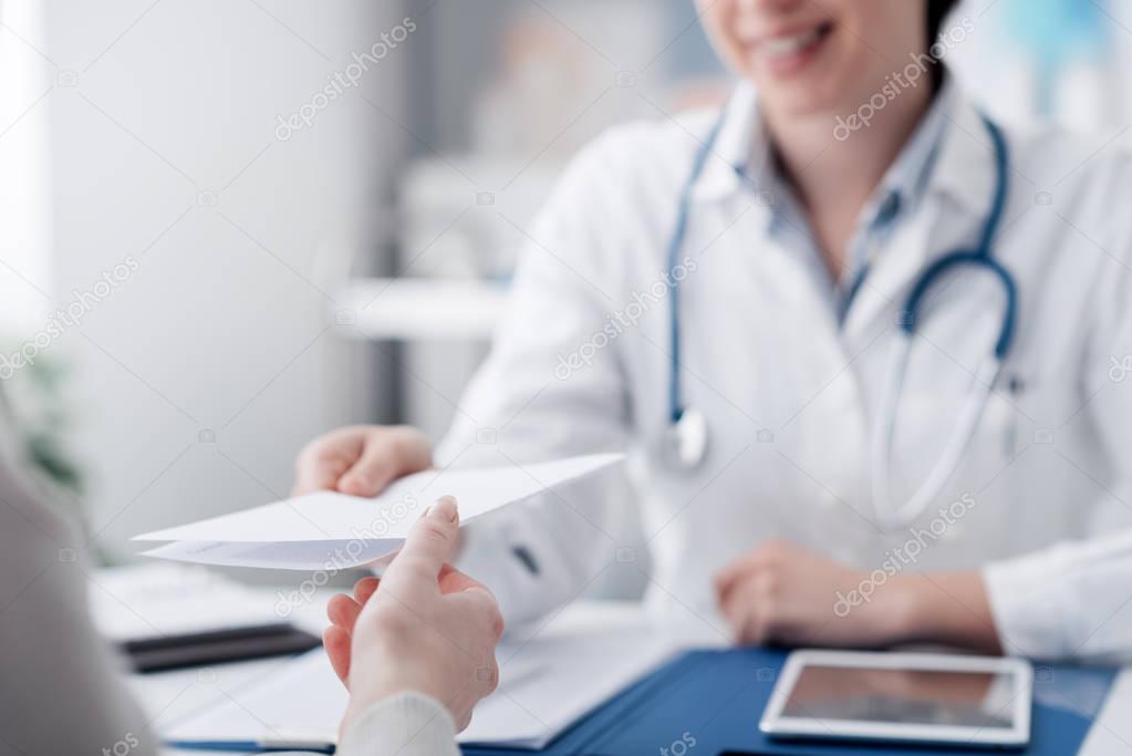 Doctor giving a prescription