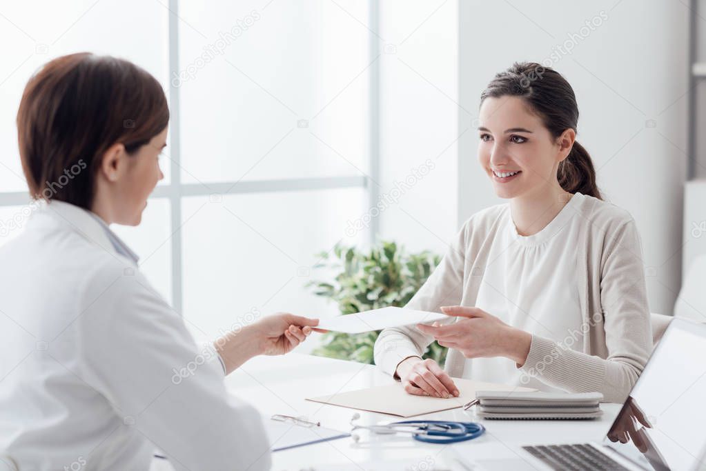 Patient receiving a prescription