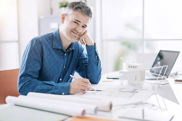 Confident Professional Architect Posing His Office Smiling Camera Sitting Desk — Stock Photo, Image