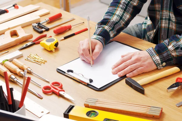 Man Sketching Diy Project Clipboard Work Tools All Hands Close — Stock Photo, Image