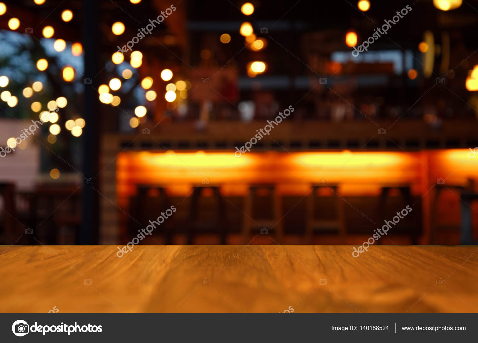 Wood table for display with llight blur night bar background Stock Photo by  ©madamLEAD 140188524