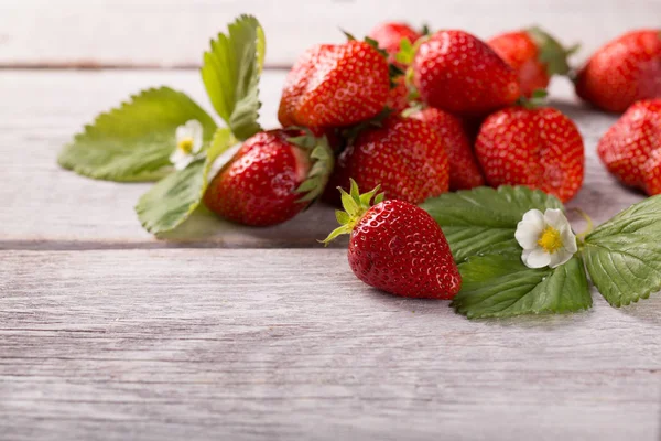 Strawberry on wooden table — Stock Photo, Image