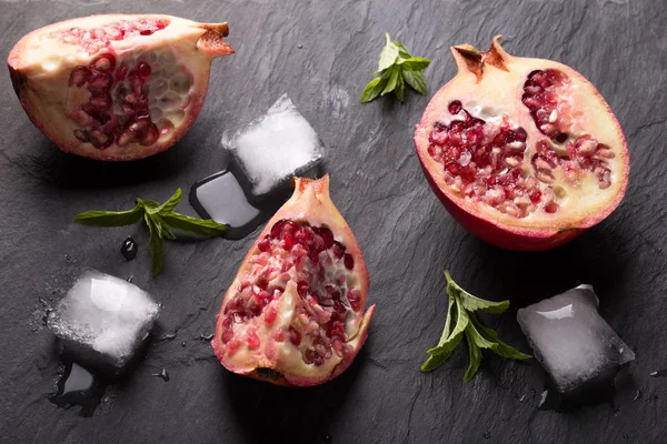 Pomegranate juice over wooden table — Stock Photo, Image