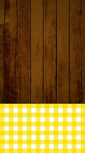 Wooden planks with orange tablecloth — Stock fotografie