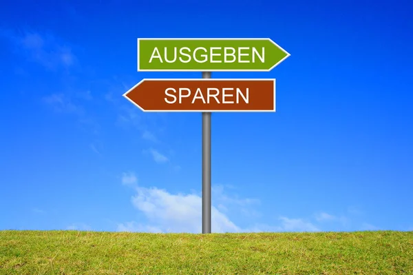 Signpost mostrando Spend or Safe alemão — Fotografia de Stock