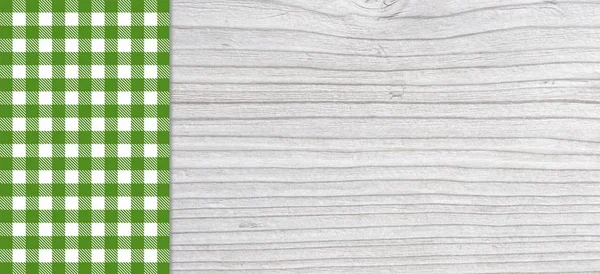 Traditionele licht grijs plank met groen tafellaken — Stockfoto