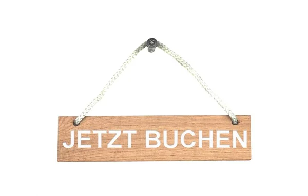 Wooden sign with rope: Book now german — Stock Photo, Image