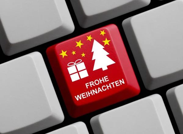 Feliz Navidad en el ordenador teclado alemán — Foto de Stock