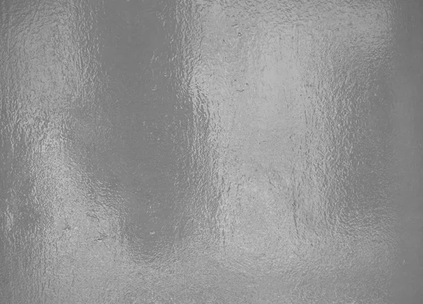 Светоотражение на серой серебряной фольге — стоковое фото