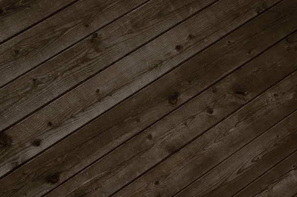 Dark brown diagonal wooden planks — Stock Photo, Image