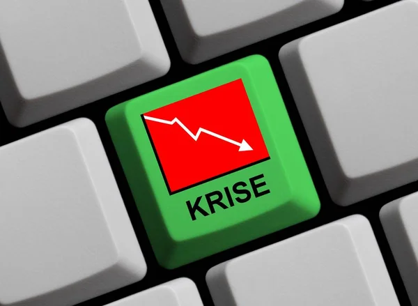 Crise Online em língua alemã no teclado do computador verde — Fotografia de Stock