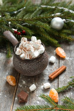 Marshmallow seramik bir tencerede twigs mandarin dilim yedim.. 