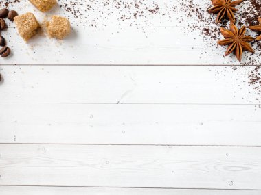 Arka plan ile farklı kahve, kahve çekirdeği, toprak ve anında, çikolata, kahverengi şeker ve yıldız anason, kopya alanı, üst görüntüleme.