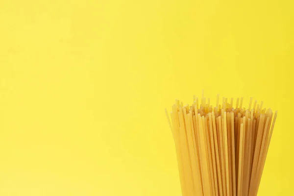 Dry Pasta Spaghetti Yellow Background Copy Space — Stock Photo, Image