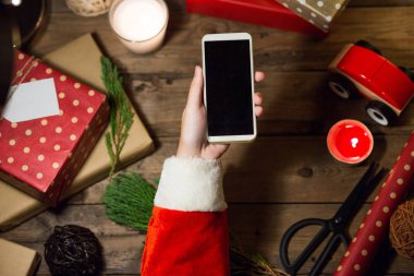 Santa kullanım akıllı telefon boşaltmak için Christmas.Chr ile sahte