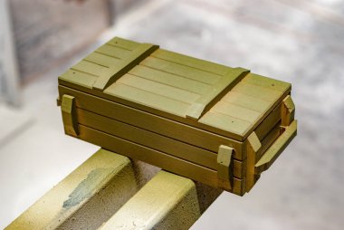 Military style souvenir boxes in paint booth