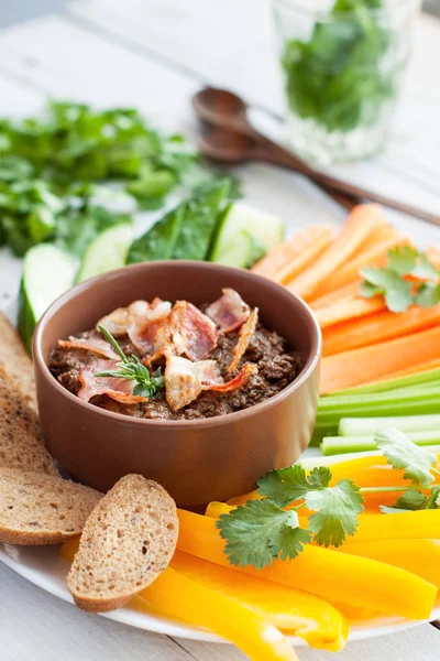 Beef bacon liver pate with raw vegetables — Stock Photo, Image