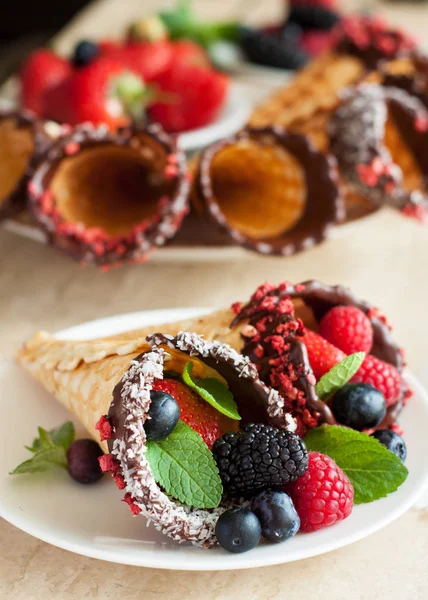 Dark Chocolate-Dipped Waffle Cones with berries — Stock Photo, Image
