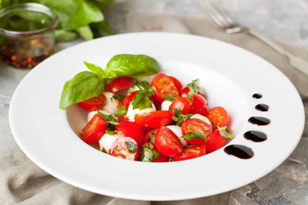 Mozzarella, cherry tomatoes and basil salad