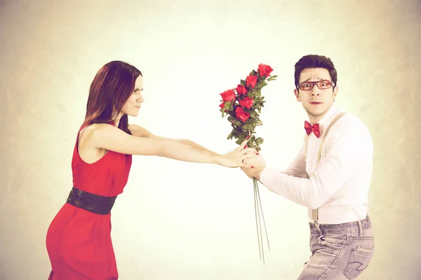 Angry woman refuses roses for Valentine's Day — Stock Photo, Image