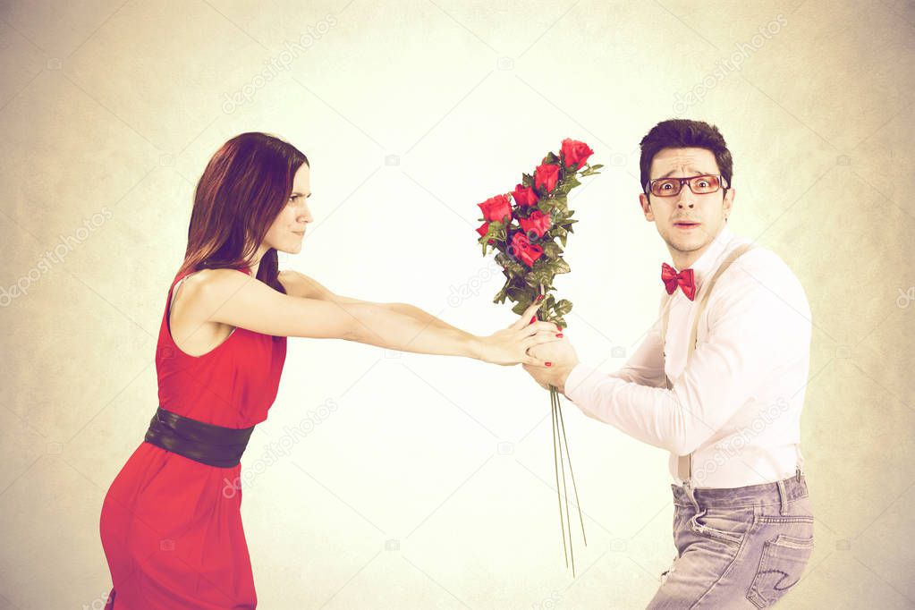 angry woman refuses roses for Valentine's Day