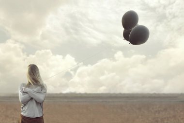 Siyahlar balonlar ile yalnız kadın yüzünü sakladı