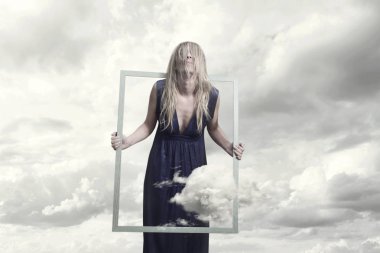 surreal image of a woman who tries to free herself and run away from the frame that contains her clipart