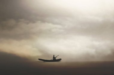 Yalnız adam bozulmamış doğanın arasında bir kanoda gezer.