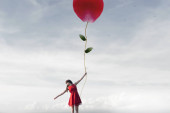 dreamy woman flies clinging to a heart-shaped flower