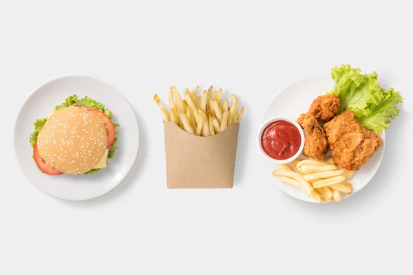 Concept of mock up burger, french fries and fried chicken set isolated — Stock Photo, Image