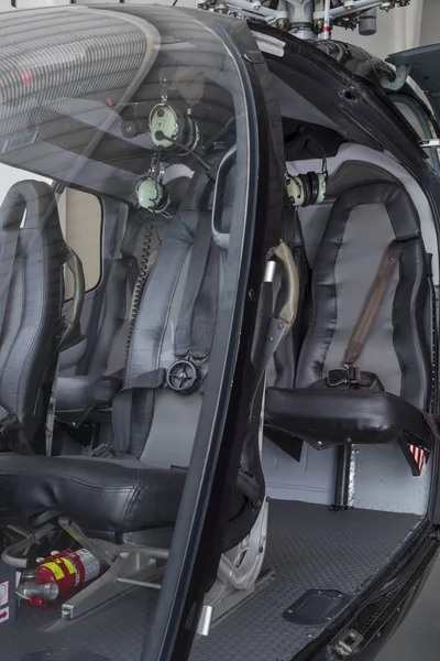 Helicopter interior safety belts and seats for passengers of Eurocopter luxury helicopter.