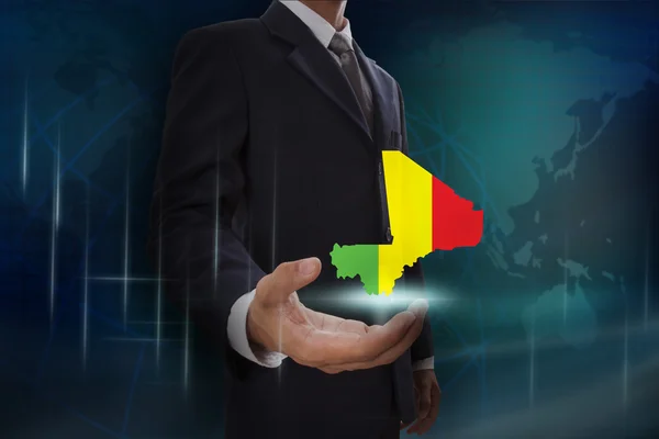 Affärsman med karta och flaggan av Mali — Stockfoto