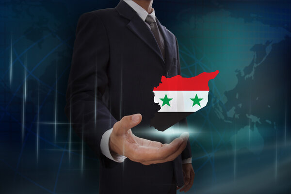 Businessman with map and flag of Syria