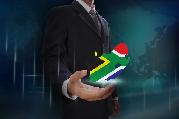 Uomo d'affari con mappa e bandiera di Sudafrica — Foto Stock
