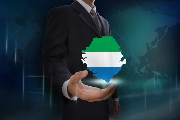 Businessman with map and flag of Sierra Leone — Stock Photo, Image